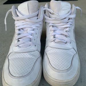 white Nike high tops